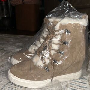 Brand new Steve Madden faux fur platform booties